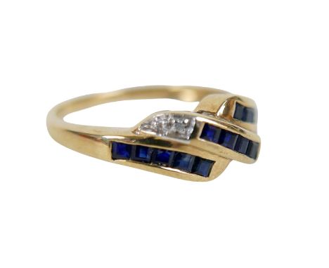 A sapphire ring in three-wave style, with small diamond chips on unmarked gold band, size M.
