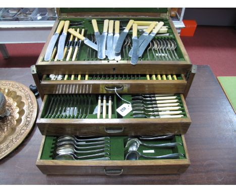 An Early XX Century Oak Cased Canteen of Plated Cutlery, by Cooper Bros Sheffield, including ladle, basting spoon, fish serve