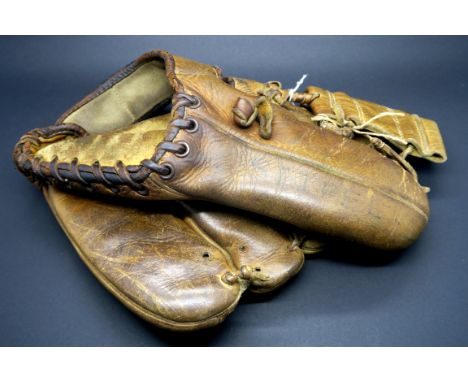 A Vintage Left Handed Leather Baseball Glove.