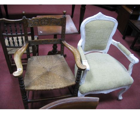 A  White Painted French Style Armchair, with floral carving, moquette seat and back; oak armchair with star carved top rail o