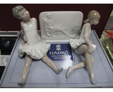 Two Nao Seated Ballerinas, Lladro Collectors Society plaque and two wallets plus box.