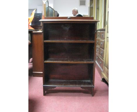 An Early XX Century Mahogany Bookcase, with a low back moulded edge, two adjustable shelves on bracket feet.