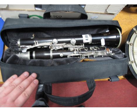 A Boosey & Hawkes London Series 2-20 Clarinet, in a black case.