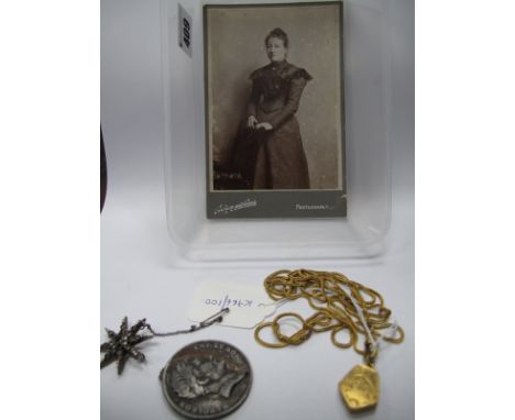 A Colourless Paste Set Starburst Brooch, with a photograph of a lady called Beatrice Fanshaw (who was born in 1894) wearing t