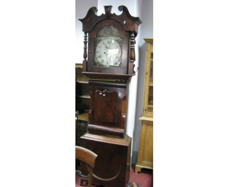 A Mid XIX Century Mahogany Long Case Clock, broken swan neck pediment, arched door flanked by ring turned supports, broad tru