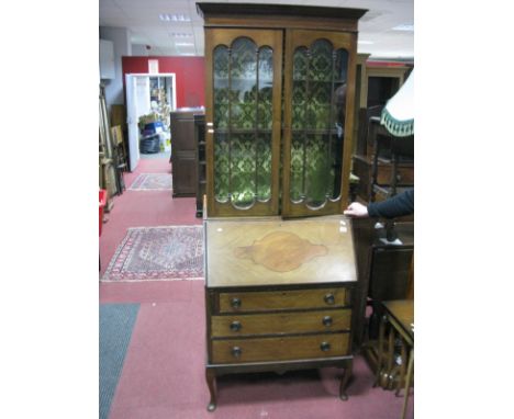 An Edwardian Mahogany Bureau Bookcase, top with glazed doors, two internal shelves, bureau with a fall front, fitted interior