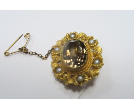 A 9ct Gold XIX Century Style Brooch, oval collet set to the centre, with pearl highlights.