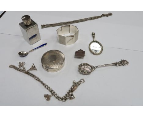 A Hallmarked Silver Napkin Ring, "Margaret", engine turned; together with a small pill box, with internal mirror, a charm bra