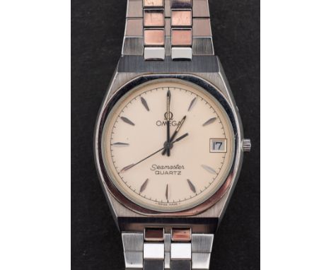 Omega Seamaster, a gentleman's stainless steel wristwatch the cream dial with raised tapered baton numerals and hands, a swee