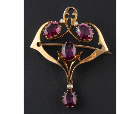 An oval, mixed-cut garnet and seed pearl, openwork brooch/pendant, length ca. 4.8cm, total weight ca. 7.5gms. 