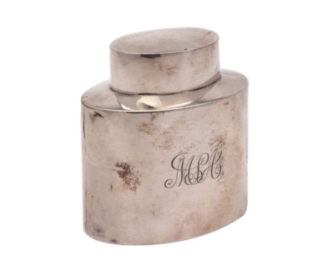 A George V silver tea caddy and cover, maker William Aitken, Birmingham, 1911 of plain oval outline, initialled, in a fitted 