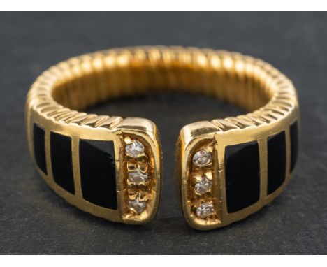An Italian, onyx and single-cut diamond ring, of 'gas pipe' design, with Italian control marks for 18ct gold, estimated diamo