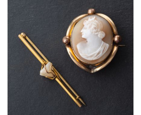 Two brooches, including a bar brooch encasing a baroque-shaped pearl, stamped '9CT'; and a shell cameo brooch depicting Diana