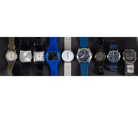 A group of nine fashion brand and other watches including Next, Hugo Boss, Braun, Nixon, Lorus, Timex and Casio.