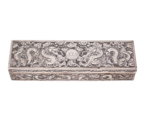 A late 19th Century Chinese silver rectangular box, makers Wang Hing &amp; Co., Hong Kong, the hinged cover and sides embosse