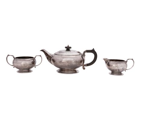 A George VI silver three-piece tea service, makers Mappin and Webb, Birmingham 1937 of squat circular form, comprising a teap