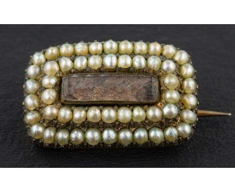 An early Victorian, silver gilt, hairwork and seed pearl sentimental brooch, engraved to verso ' To my dear Margaret Demerara