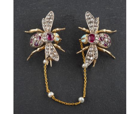 A pair of early 20th century, rose-cut diamond and mixed-cut ruby bee brooches, with cabochon-cut opal eyes and seed pearl sp