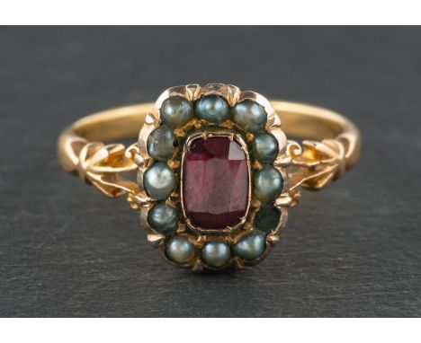 A 19th century, garnet and seed pearl cluster ring, stamped '18CT', length of ring head ca. 1.1cm, ring size M, total weight 