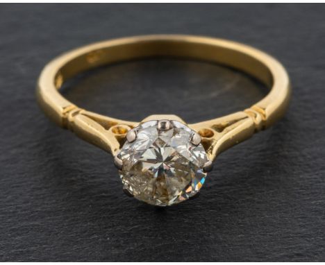 A round, brilliant-cut diamond, single-stone ring, estimated diamond weight ca. 0.80ct J-K colour, P1-2 clarity, stamped '18C