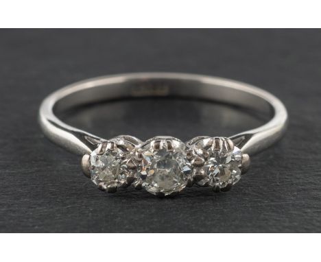 A round, brilliant-cut diamond, three-stone ring, total estimated diamond weight ca. 0.55ct, I-J colour, SI1-2 clarity, stamp