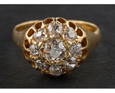 A late Victorian, old-cut diamond cluster ring, total estimated diamond weight ca. 1.30cts, G-H colour, VS2-SI1, with hallmar