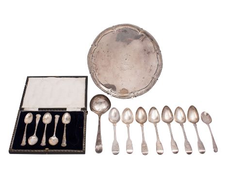 A Victorian small silver salver, makers Harrison Brothers &amp; Howson, Sheffield 1892 of shaped circular outline with a gadr