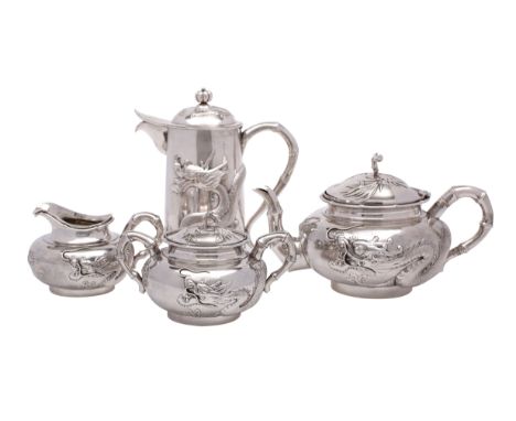 A Chinese silver matched four-piece tea service, three items by Wang Hing &amp; Co, Hong Kong, the milk jug maker KMS, each p