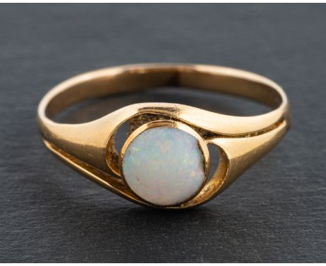 A round, cabochon-cut opal ring, estimated opal weight ca. 0.35ct, length of ring head ca. 1.5cm, ring size M, total weight c