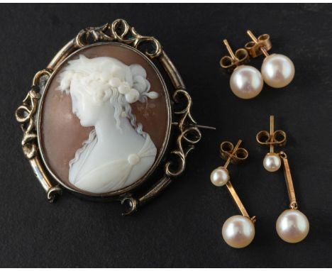 A pair of 9ct gold, cultured pearl ear studs, a pair of cultured pearl drop earrings and a shell cameo brooch depicting a lad