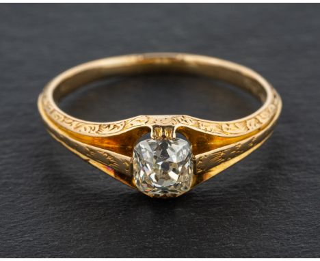 A cushion-cut, single-stone diamond ring, estimated diamond weight ca. 0.65ct, I-J colour, VS1-2 clarity, with engraved folia