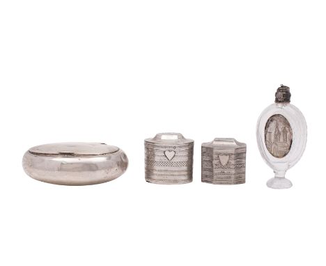 A George V silver oval tobacco box, makers Charles S. Green &amp; Co. Birmingham 1918, 9cm long, 73gms, 2.3ozs, two continent