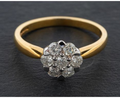 A round, brilliant-cut diamond cluster ring, total diamond weight ca. 0.50ct according to mark, with partial hallmarks for Lo