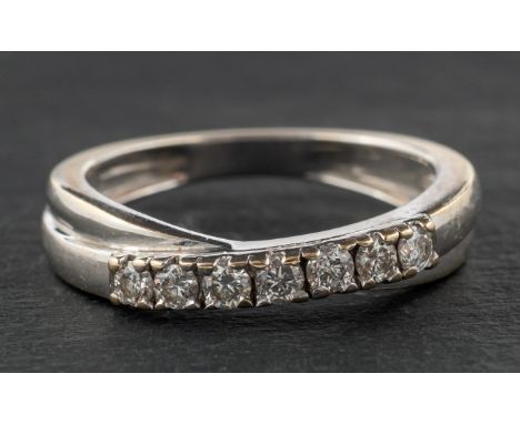 An 18ct gold, round, brilliant-cut diamond, cross-over, half-eternity ring, diamond weight 0.25ct according to engraving, wit