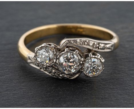 An old-cut diamond, three-stone ring, total estimated diamond weight ca. 45ct, H-I colour, SI1-2 clarity, stamped '18CT', len