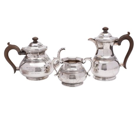 A George VI silver three-piece tea-service, makers Mappin and Webb, London 1939, with inscription, of octagonal and pear shap