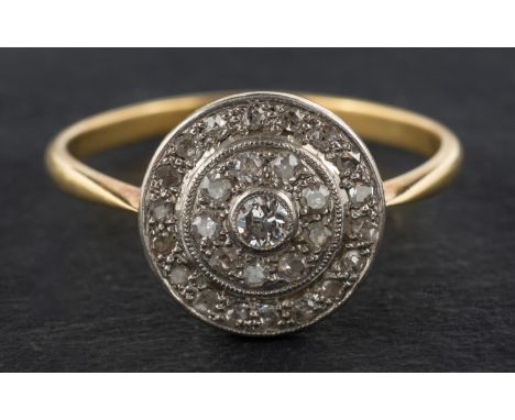 A single and old-cut diamond target ring, total estimated diamond weight ca. 0.20ct, stamped '18', length of ring head ca. 1c