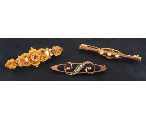 Three gemset brooches, a synthetic ruby brooch, stamped '15CT', length ca. 4.2cms, weight ca. 3gms; an openwork imitation pea