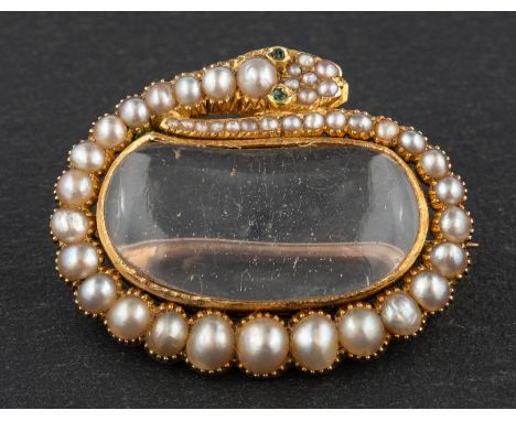 A Georgian locket brooch, designed as a pearl-set snake surrounding a glazed compartment, with inscription to verso 'Sarah Pa