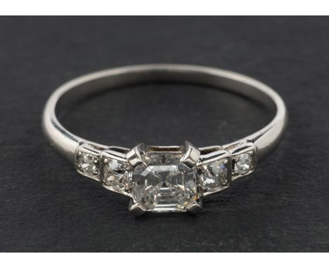 An old and octagonal step-cut diamond ring, estimated weight of principal diamond ca. 0.55ct, H-I colour, VS1-2 clarity, tota