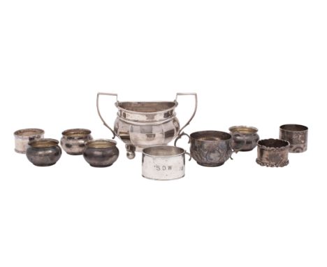 A set of four Edward VII  silver salts, maker Charles Edwards, London 1904, together with four assorted silver napkin rings, 