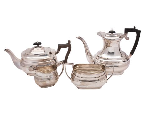 A George V silver three-piece tea service, makers William Hutton &amp; Sons Ltd, Sheffield 1918 of oblong ribbed form compris