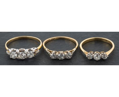 Three old-cut diamond three-stone rings, including a ring, total estimated diamond weight ca. 0.75ct H-I colour, VS2-SI1 clar