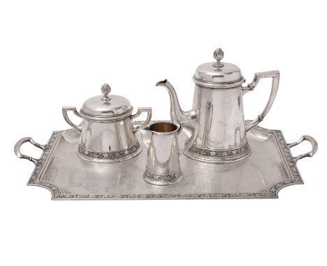 A Swiss silver 800 three-piece coffee set on a twin-handled tray, each piece decorated with a band of continuous leaves and f