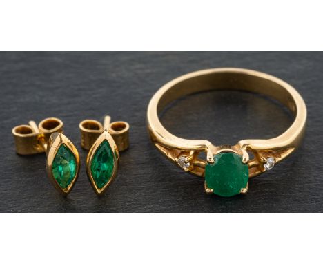 A round, mixed-cut emerald and diamond, three-stone ring and a  pair of navette-shaped, emerald ear studs, estimated emerald 