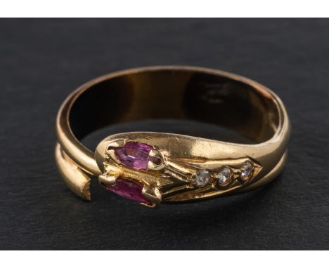 A ruby and white paste snake ring, stamped '585', length of ring head ca. 1.5cm, ring size N, total weight ca. 3.4gms.