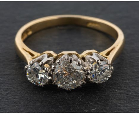 An 18ct gold, round, brilliant-cut diamond, three-stone ring, total estimated diamond weight ca. 1ct, I-K colour, SI2-P2 clar