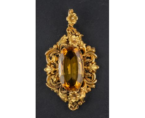 An oval, mixed-cut citrine pendant, with foliate and floral surround, estimated citrine weight ca. 15cts, total length (inc. 