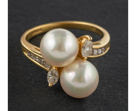 An 18ct gold, cultured pearl, marquise and step-cut diamond, cross-over ring, diameter of cultured pearls ca. 7.9-8mms, total