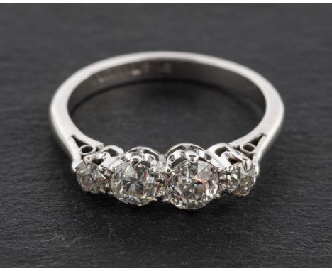 An old-cut diamond, four-stone ring, total estimated diamond weight ca. 0.50ct, I-J colour, SI2-P1 clarity, marked 'PLATINUM'